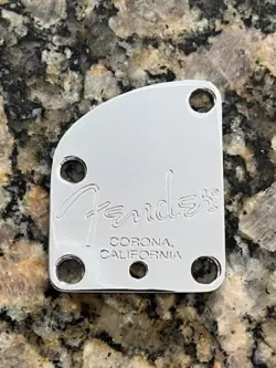 FENDER DELUXE SERIES CONTOURED NECK PLATE CHROME