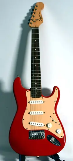 SQUIER STRAT MINI BY FENDER GREAT CONDITION PRO SETUP, SOFT CASE.