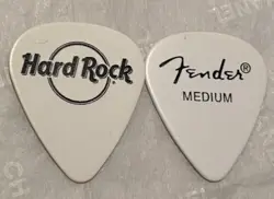 HARD ROCK CAFE- FENDER GUITAR PICKS- WHITE W/BLACK LETTERING-STAMPED FENDER RARE