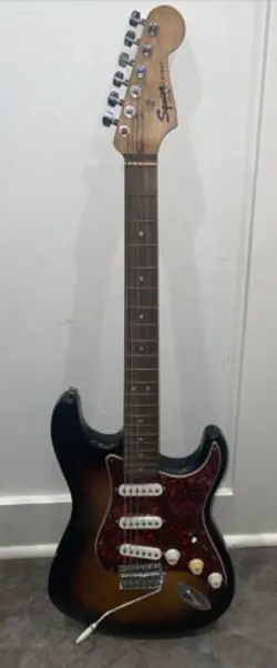 SQUIER STRAT BY FENDER SUNBURST ELECTRIC GUITAR - CRACK