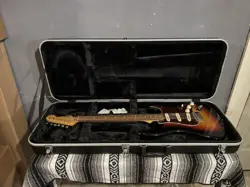SQUIER BY FENDER STRATOCASTER ELECTRIC GUITAR SUNBURST AND HARD CASE WITH KEY