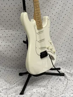 WHITE ELECTRIC GUITAR ASSEMBLED FROM MOSTLY FENDER PARTS.  ST STYLE