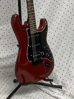 CINNAMON RED ELECTRIC GUITAR ASSEMBLED FROM MOSTLY FENDER PARTS.  ST STYLE