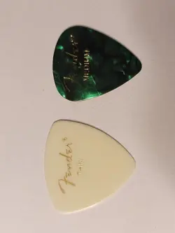 2 FENDER GUITAR PICKS, THIN & MEDIUM, PLEASE READ