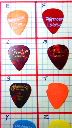 25 ASSORTED PICKS AS SHOWN