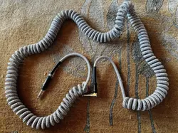 FENDER COILED GUITAR/INSTRUMENT CABLE, GRAY , STRAIGHT TO RIGHT-ANGLE
