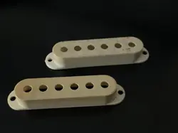 1960'S 70'S FENDER STRATOCASTER PICKUP COVERS.