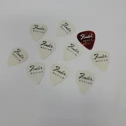 VINTAGE GUITAR PICKS-1960’S FENDER 351-WHITE MEDIUM GAUGE LOT OF 10 -NOS