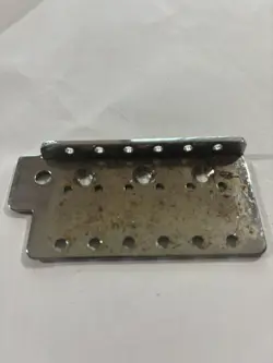 1998 FENDER STRATOCASTER MIM CHROME SIX-POINT TREMOLO BRIDGE PLATE