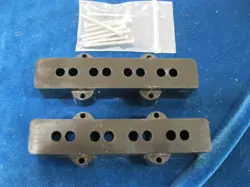 TWO VINTAGE 1970'S FENDER JAZZ BASS PICKUP COVERS