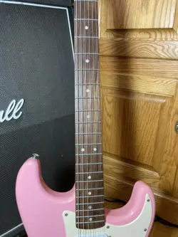 2009 SQUIER BY FENDER BULLET STRATOCASTER W/TREMOLO PINK WITH ROSEWOOD FRETBOARD