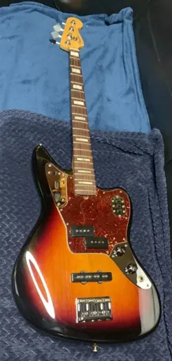 FENDER USA AMERICAN STANDARD JAGUAR BASS USED WITH HARD CASE AND ACCESSORIES