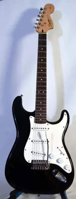 SQUIER STRAT BY FENDER ELECTRIC GUITAR GOOD CONDITION PRO SETUP NEW SOFT CASE.