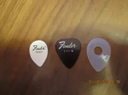 LOT OF 3 VINTAGE GUITAR PICKS 2 VINTAGE FENDERS  & 1 MOSHAY NYLON - NOS A71