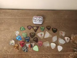 VINTAGE GUITAR PICKS LOT STASH PICKS FENDER FIRST ACT TAYLOR GUITARS D'ANDREA