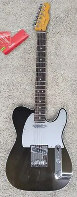 FENDER AMERICAN ULTRA TELECASTER, ROSEWOOD FRETBOARD, TEXAS TEA FINISH WITH CASE