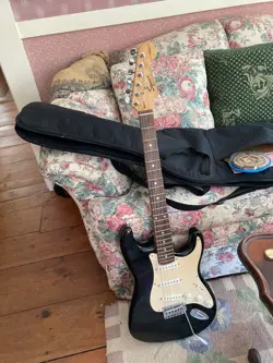 BLACK FENDER SQUIER STRAT GUITAR AND CASE