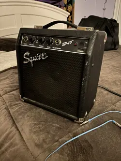 AMPLIFIER WITH GUITAR