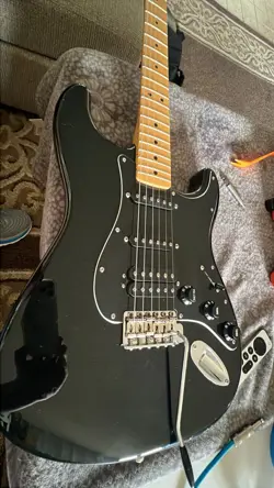 FENDER STRATOCASTER ELECTRIC GUITAR WITH GIG BAG AND STRAP