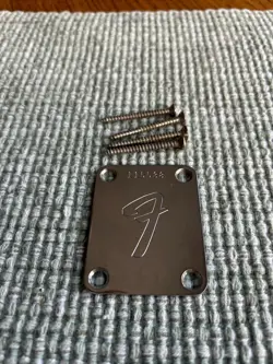 ORIGINAL 1966 FENDER MUSTANG GUITAR NECK PLATE AND SCREWS