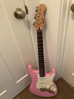 2014 SQUIER BY FENDER BULLET STRAT STRATOCASTER IN PINK WITH TREMOLO