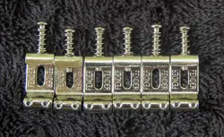 FENDER STAMPED STRATOCASTER SADDLE SET OF 6