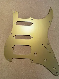 GENUINE STRATOCASTER AMERICAN DELUXE 11-HOLE GOLD ANODIZED PICK GUARD
