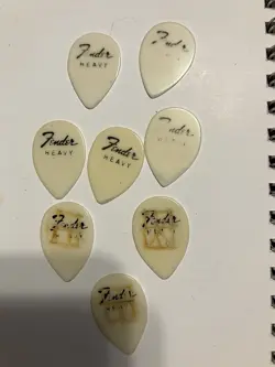 VINTAGE FENDER , NO R, WHITE TEARDROP, HEAVY GUITAR PICKS-LOT OF 8.