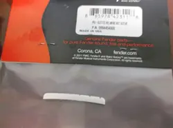 NEW GENUINE FENDER SLOTTED MELAMINE NUT FOR STRAT & TELE - 099-4404-000