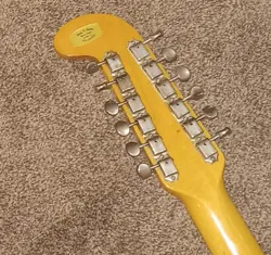 ACOUSTIC-ELECTRIC GUITAR IN