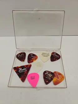 VINTAGE FENDER GUITAR PICKS LOT OF 9