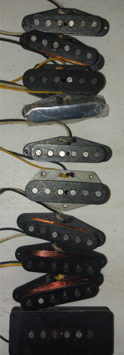 9 FENDER PICKUPS AND 1 PICKUP THAT I AM UNSURE OF BRAND
