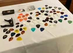 JIMI HENDRIX PICK COLLECTION AND CAPO WHITE FENDER TEARDROP PICKS DISCONTINUED