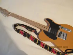 USED AMERICAN MADE FENDER TELECASTER ELECTRIC GUITAR IN GOOD CONDITION.
