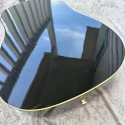 BLACK ACOUSTIC GUITAR