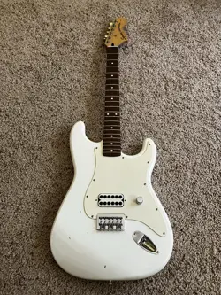 ORIGINAL SQUIER BY FENDER TOM DELONGE STRATOCASTER ELECTRIC GUITAR - WHITE