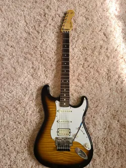  90'S MADE IN JAPAN FENDER FOTO FLAME FLOYD ROSE STRATOCASTER. 