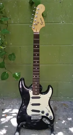 2002 FENDER STRATOCASTER SQUIER SERIES 20TH ANNIVERSARY PLAYED GUITAR