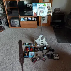 SOME FENDER GUITAR ACCESSORIES STRAP, PICK GUARD,HAMILTON MUSIC STAND. & STUFF.