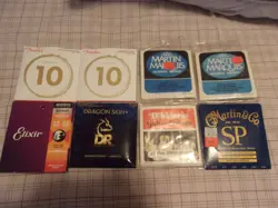 8 NEW SETS OF 6 STRING ACOUSTIC GUITAR STRINGS /FENDER, DR, ELIXIR & D'ADDARIO