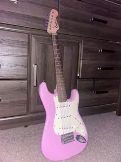 SQUIER MINI FENDER ELECTRIC GUITAR (PINK)