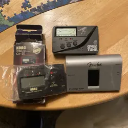 3 GUITAR TUNER  LOT KORG CA-30 NEW, FENDER ST-1 STAGE TUNER AND 1 MORE