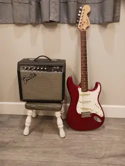 RED FENDER SQUIER MADE IN INDONESIA STRATOCASTER W/ AMP FENDER 15G