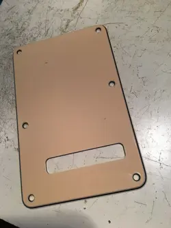 GENUINE FENDER STRAT AGED WHITE PARCHMENT 3 PLY TREM SPRING COVER PLATE