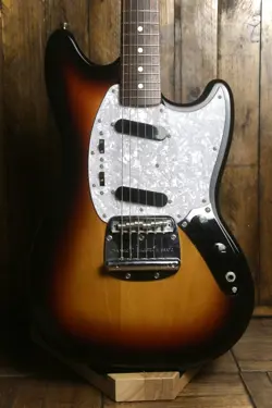 LEGENDARY 1994-1995 FENDER MUSTANG MG-69 REISSUE, CRAFTED IN JAPAN, SUNBURST