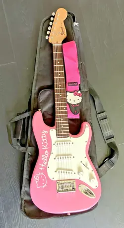VINTAGE FENDER SQUIRE MINI HELLO KITTY PINK ELECTRIC GUITAR WITH STRAP & CASE