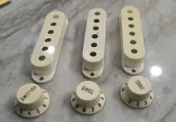 AUTHENTIC VINTAGE 1982, SET OF 3 FENDER STRATOCASTER KNOBS AND 3 PICKUP COVERS