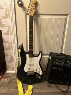 SQUIRE ELECTRIC GUITAR BY FENDER