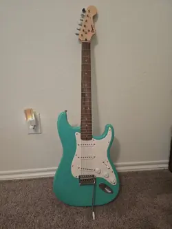 BLUE FENDER SQUIER BULLET GUITAR