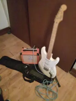 START A MUSICAL JOURNEY FENDER ELECTRIC GUITAR COMBO & ORANGE AMP